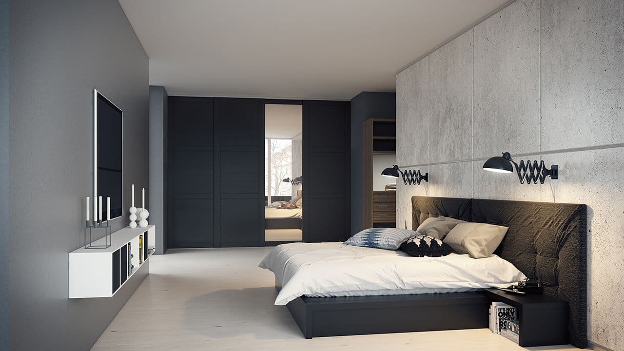 Soverom med mørke farger og garderobeskap.