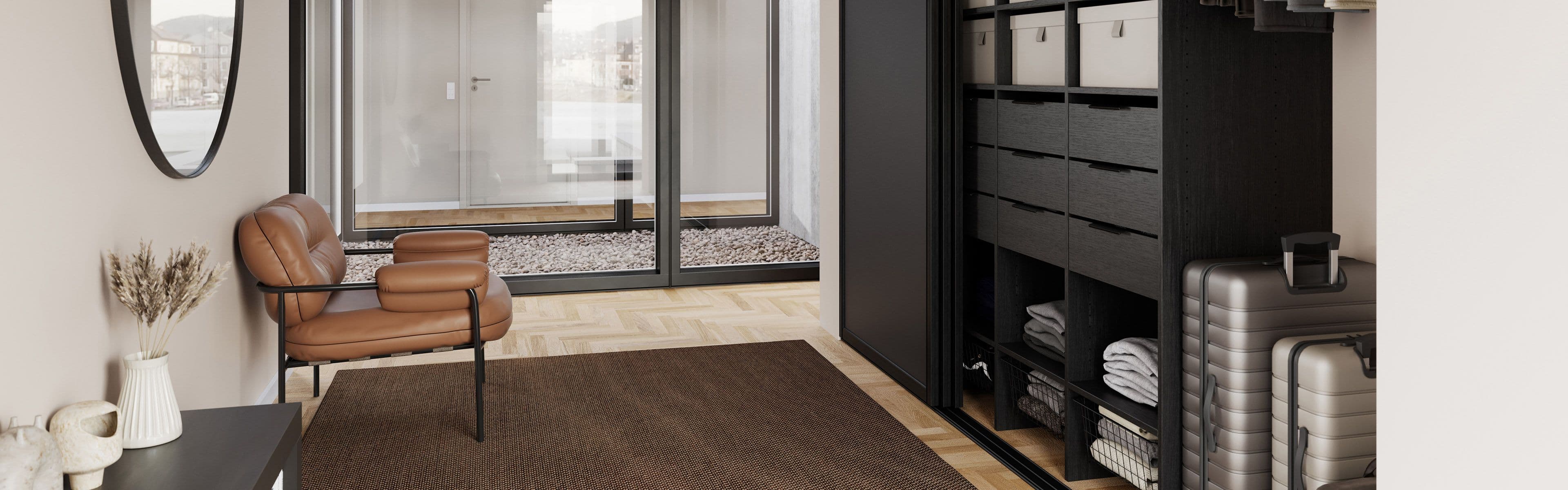 Moderne garderobeløsning for entré med svarte skyvedører fra Langlo.